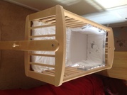 Mothercare swinging crib with bedding