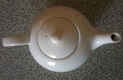 Teapot and hanging wicker heart