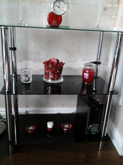 1x3 Tier black glass stand.